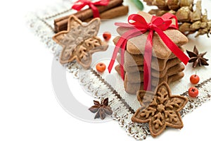 Christmas cookies handmade in the shape of stars with red ribbon