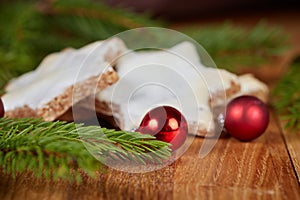 Christmas cookies on table with fir branches