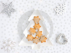 Christmas Cookies on Tree Shaped Plate with Christmas Decoration