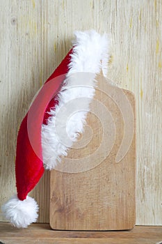 Christmas cooking abstract background with santa claus hat