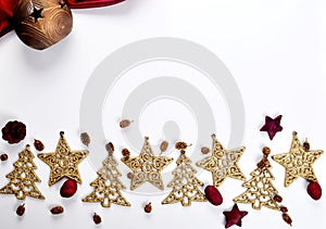 Christmas corner border with gift boxes and red christmas decorations.White wooden board background.