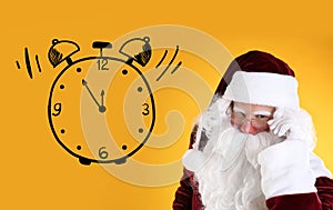 Christmas countdown. Clock showing five minutes to midnight near Santa Claus on yellow background