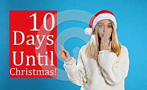 Christmas countdown. Surprised woman wearing Santa hat on blue background near text
