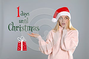 Christmas countdown. Surprised woman wearing Santa hat on light grey background near text