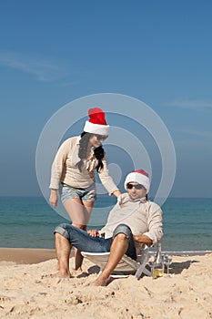 Christmas couple on a beach