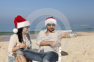 Christmas couple on a beach