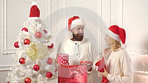 Christmas couple with Christmas gifts. Happy family on christmas background with gift box. Merry christmas and Happy new