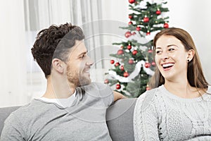 Christmas couple is happy and laugh