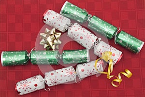 Christmas crackers on red background