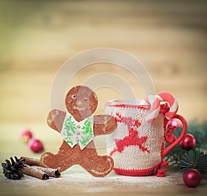 Christmas Cup ornament and a fun gingerbread on a wooden table