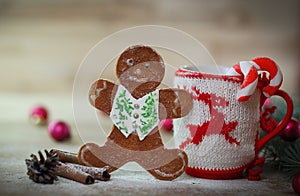 Christmas Cup ornament and a fun gingerbread on a wooden table