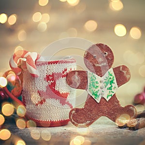 Christmas Cup ornament and a fun gingerbread on a wooden table