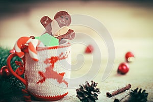 Christmas Cup ornament and a fun gingerbread on a wooden table