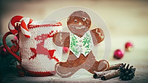 Christmas Cup ornament and a fun gingerbread on a wooden table