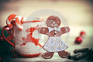 Christmas Cup ornament and a fun gingerbread on a wooden table