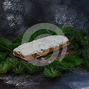 Christmas cupcake, stollen, with candied fruit and icing sugar