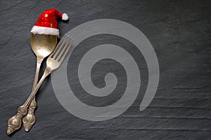 Christmas cutlery on the table abstract food background