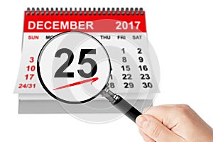Christmas Day Concept. 25 December 2017 calendar with magnifier