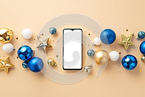 Christmas Day concept. Top view photo of mobile phone star ornaments confetti white blue and gold baubles on isolated beige