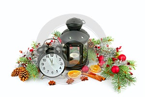 Christmas decor, alarm clock, lantern and spruce twigs isolated on white background