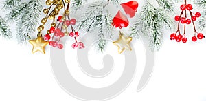 Christmas decor border. Green Xmas fir branch, gold stars, red holly berries and glass baubles isolated on white background