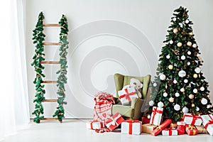 Christmas decor interior Christmas tree with gifts for the new year holiday postcard as a background
