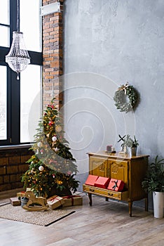 Christmas decor in the living room loft style with large Windows, Christmas tree