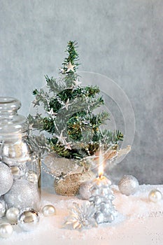 Christmas decor with silver balls and candle