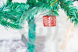 Christmas with decorated item hanging in a tree , Merry christmas and happy new year Closeup of Christmas-tree and gold balls,