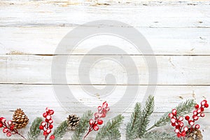 Christmas decorating elements and ornament rustic on white wood table with snowflake. photo