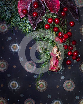 Christmas decoration background with angel, christmas tree and