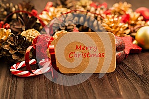 Christmas decoration, balls, fir cones, candies and red stars