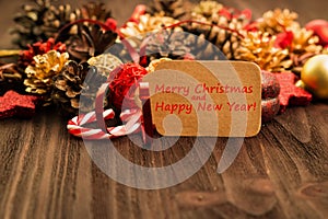 Christmas decoration, balls, fir cones, candies and red stars