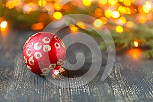 Christmas decoration with bauble. Shallow depth of field, focus on bauble