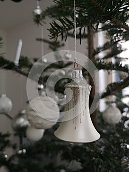 Christmas decoration baubles with branches of fir tree on white background