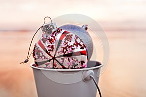 Christmas decoration on the beach at sunset time, holiday concept