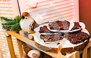 Christmas decoration with a bird and plate of cookies