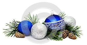 Christmas decoration blue and silver balls with fir cones and fir tree branches isolated