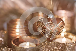 Christmas decoration and candles copper colored