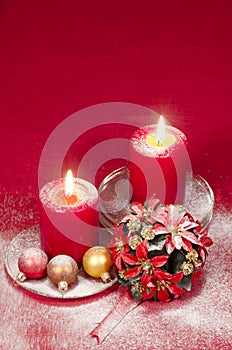 Christmas decoration with candles ribbons and cookies