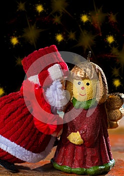 Christmas decoration, colorful angel girl candlelight and Santa