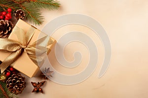 Christmas Decoration Composition On Light Gold Background, Featuring Golden Gift Box With Red Ribbon