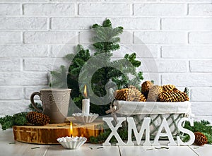 Christmas decoration with cones and letters