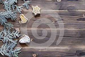 Christmas decoration with cookies on wooden background for Christmas holidays, top view