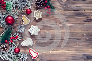 Christmas decoration with cookies on wooden background for Christmas holidays, top view