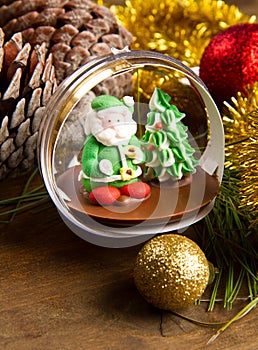 Christmas decoration and crib on wooden table