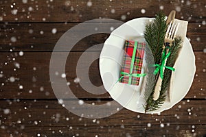 Christmas decoration cutlery on old wooden brown background