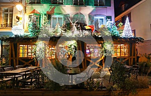 Christmas decoration of the entrance to the restaurant in Colmar, Alsace .