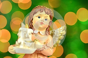 Christmas decoration, figure of angel holding a candle