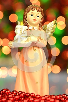 Christmas decoration, figure of angel holding a candle